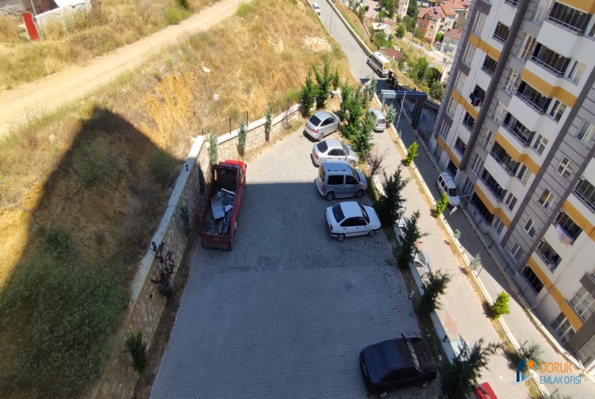 Doruk Emlak Ofisi > DORUK EMLAK OFİSİNDEN CANDAROĞLU MAHALLESİ BATIKENT SİTESİNDE KİRALIK 2+1 DAİRE